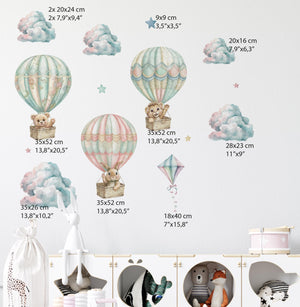 Teddy bears flying in colorful balloons