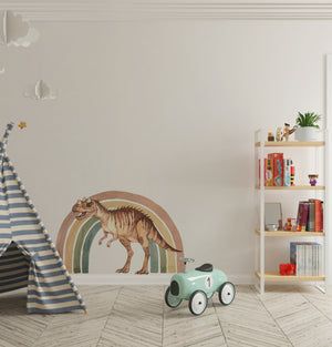 a child's room with a teepee tent and a dinosaur wall decal
