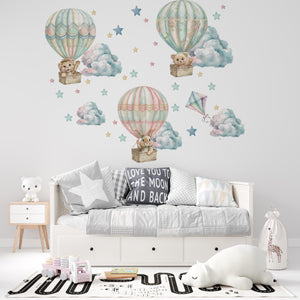 Teddy bears flying in colorful balloons