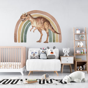 a child's room with a dinosaur wall mural