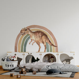 a bed with a dinosaur headboard and toys on it