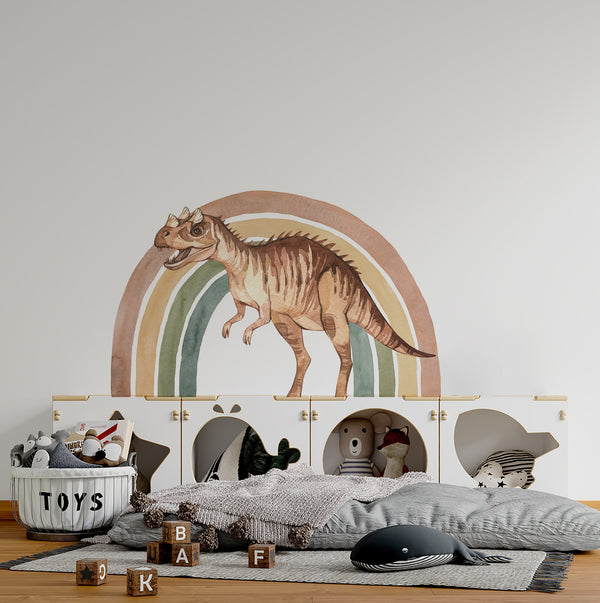 a bed with a dinosaur headboard and toys on it
