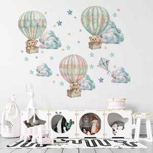 Teddy bears flying in colorful balloons