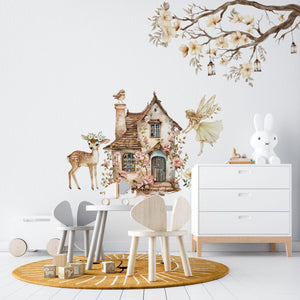 Nursery wall decals with a fairy-tale cottage and a fairy
