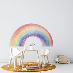 Rainbow wall decal in a child's room, pastel peel and stick sticker