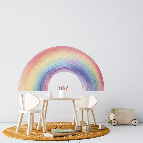 Rainbow wall decal in a child's room, pastel peel and stick sticker