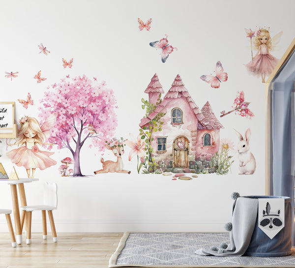 Whimsical fairy tale wall art with a cute white bunny and a sleeping baby deer next to a fairytale house.