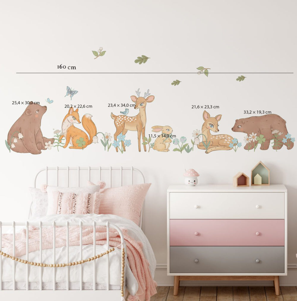 Woodland animal wall decals with a bear, deer, fox, rabbit, flowers and butterflies in a child's room