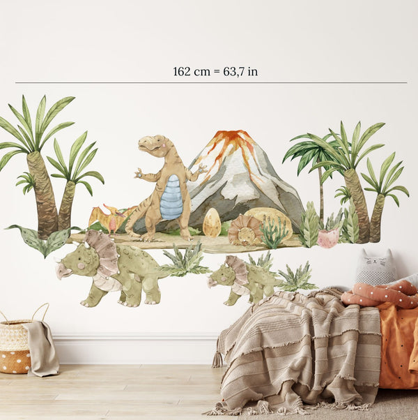 Rozmístění samolepek „Dinosauří země" o celkové šířce 162 cm na stěně dětského pokoje
