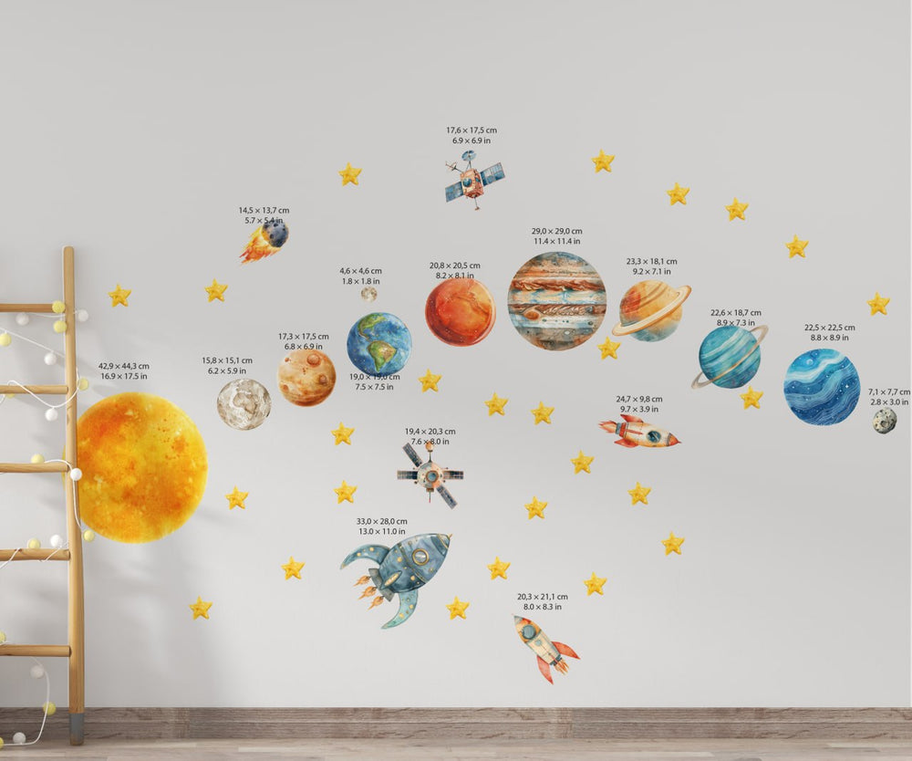 Watercolor solar system wall decals in a kids room - Sun, planets, rockets and stars above a play table by Igibee